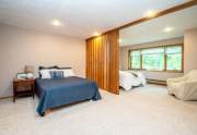 Bedrooms separated by accordion wall