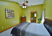 Master bedroom with vaulted ceiling