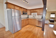 Kitchen features granite countertops