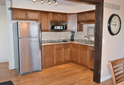 Kitchen features stainless appliances