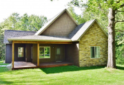 Vinyl shake siding and stone accents