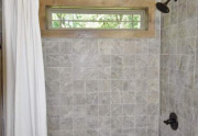 Tiled shower in guest bath